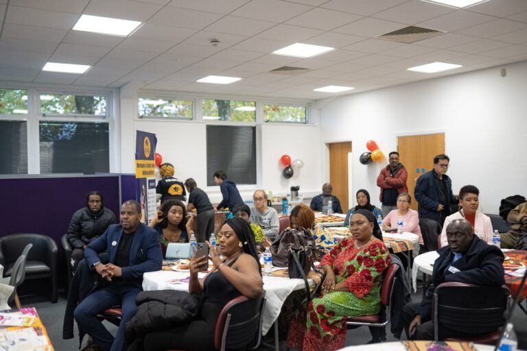 Guests listening during the Black History Month celebration