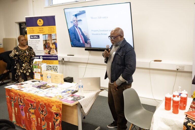 A speaker addressing the room during the event