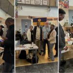 Community Upskilling team and visitors at their stall at Langworthy Cornerstone, Salford